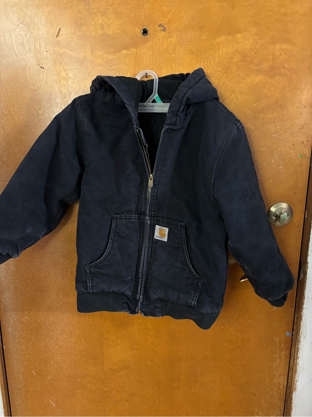 Kids Carhartt winter coat with hood. 7/8